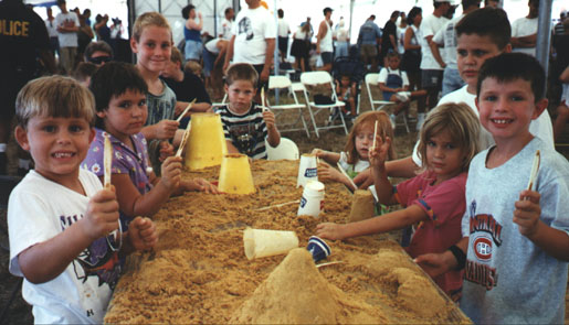 Shark Tooth Kids show their tools and smiles